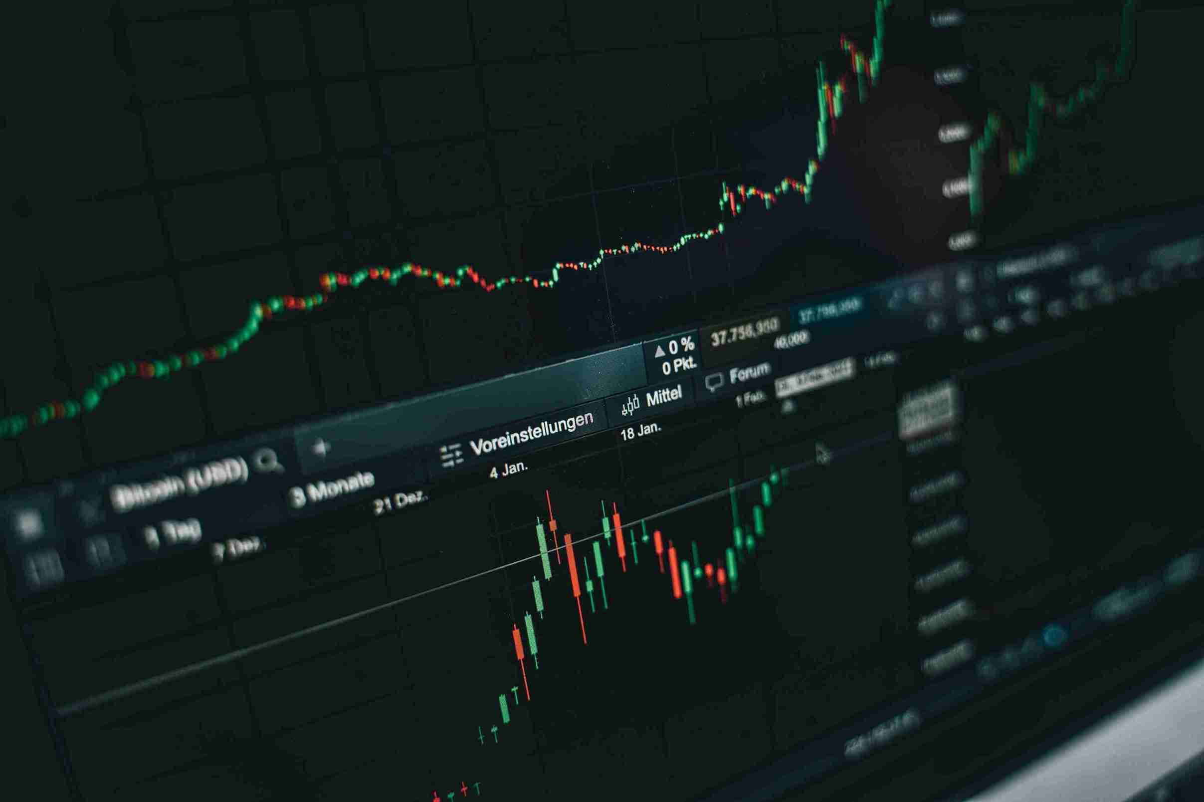 African traders using DCash app on mobile devices with trading charts in background